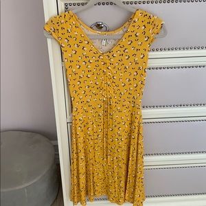 it is very summer and flowy dress.